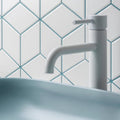 Rhombus Matt Large Mosaic cream rhombus mosaic with a white ceramic tap
