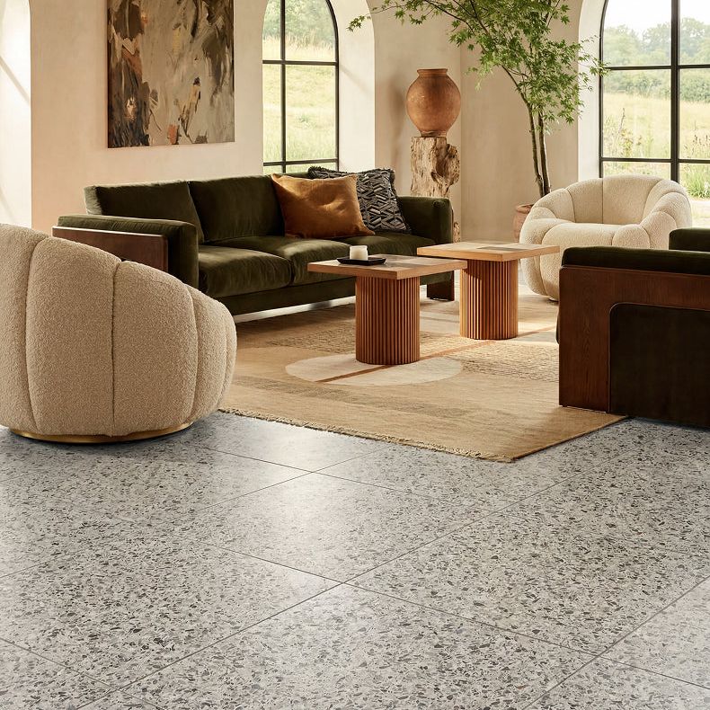 Rialto Porcelain Vert 60x60cm green terrazzo-effect tile in a room setting
