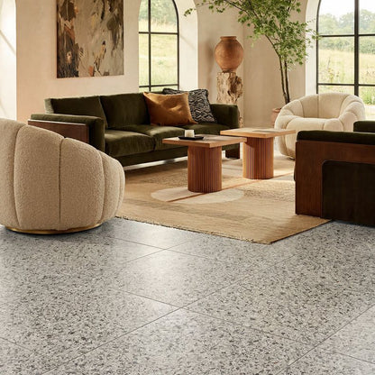 Rialto Porcelain Vert 60x60cm green terrazzo-effect tile in a room setting