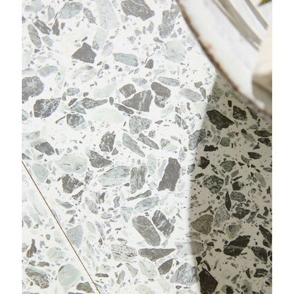Rialto Porcelain Vert green terrazzo tile in an interior scheme