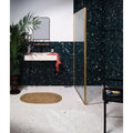 Black rialto terrazzo foscari honed bathroom wall tiles with white and gray speckles in a honed finish