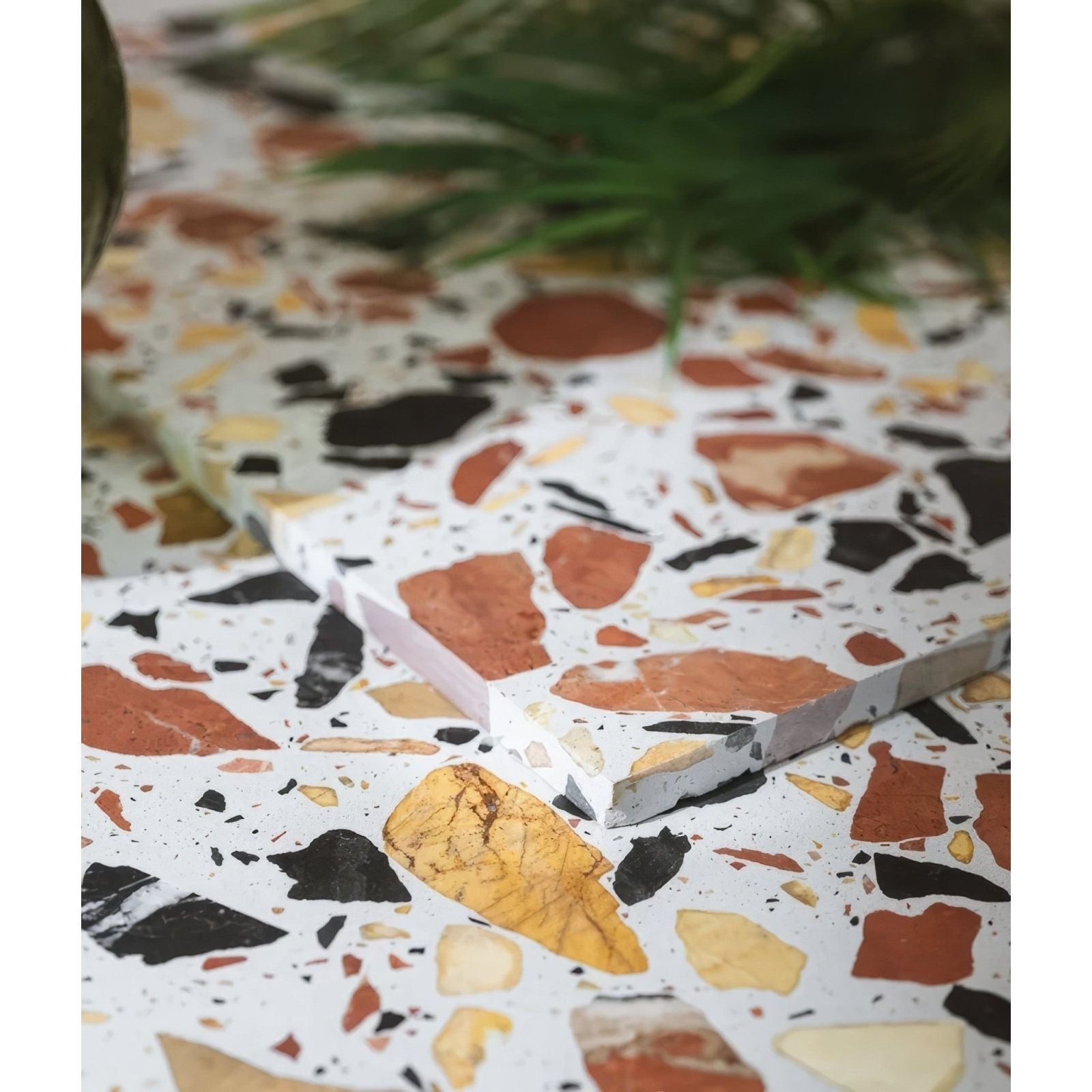 Rialto Terrazzo San Marco Honed white terrazzo tile with terracotta, black and gold fragments