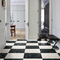 Rialto Terrazzo Veneta Honed soft pink terrazzo tiles with a black leather bench