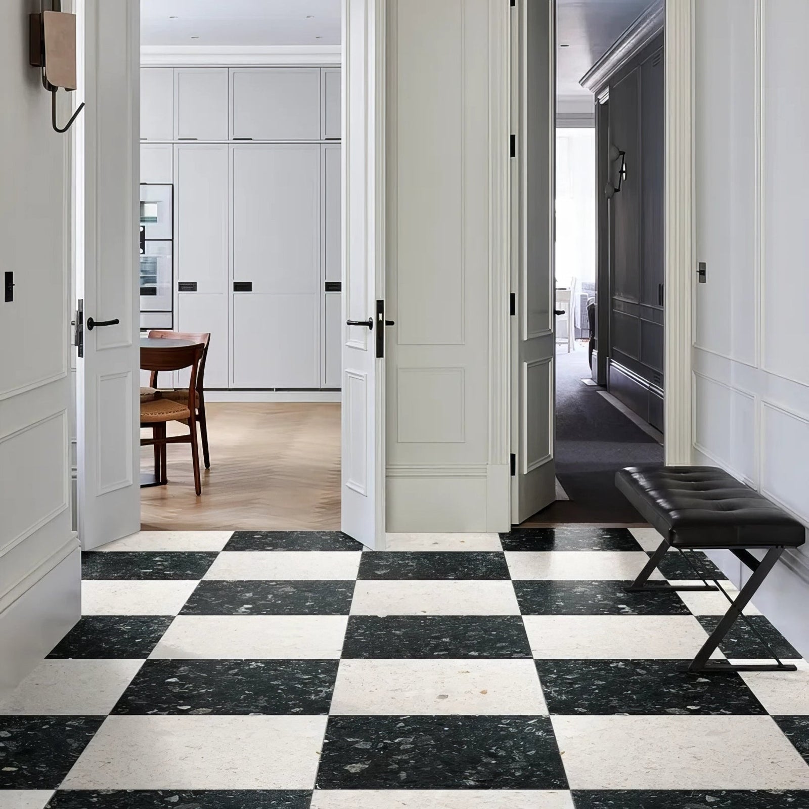Rialto Terrazzo Veneta Honed soft pink terrazzo tiles with a black leather bench