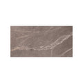 A rectangular taupe ceramic tile with subtle gray veining rimini taupe 60 x 120cm for flooring and walls