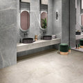Modern black ceramic vessel sinks with sleek minimalist design on a light gray marble countertop rimini white 60 x 60cm