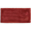 A rectangular terracotta-colored rioja brick tile with a matte finish and subtle textured ceramic surface