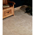 Beige riviera limestone tumbled stone tiles with subtle natural veining and light grout lines for flooring use