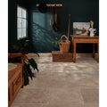 Rivieralimestone tumbled natural stone floor tiles with warm earthy tones and subtle veining for elegant interiors