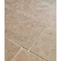 Beige riviera limestone tumbled stone tiles with natural veining and subtle texture for versatile flooring and walls