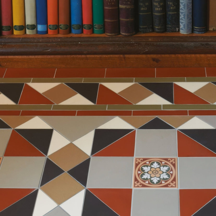 Rochester Black, Holkham Dune, Red, Regency Bath & White with Livingstone Green on Buff in a bathroom setting