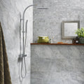 Rockies Montana Mosaic grey marble-effect mosaic with a chrome rain showerhead