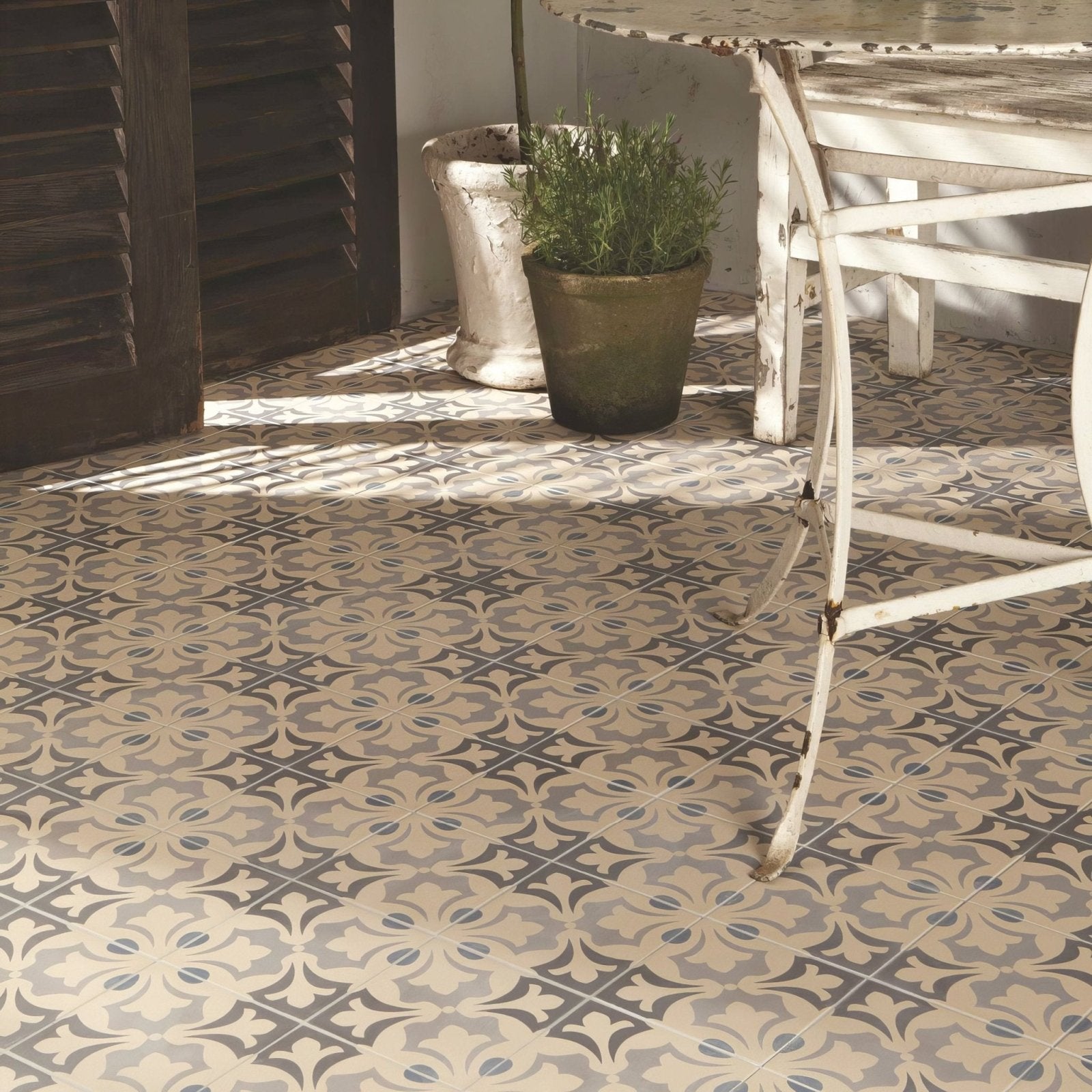 Beige and gray patterned rococo ceramic floor tiles with vintage ornate floral design in light blue gray and white