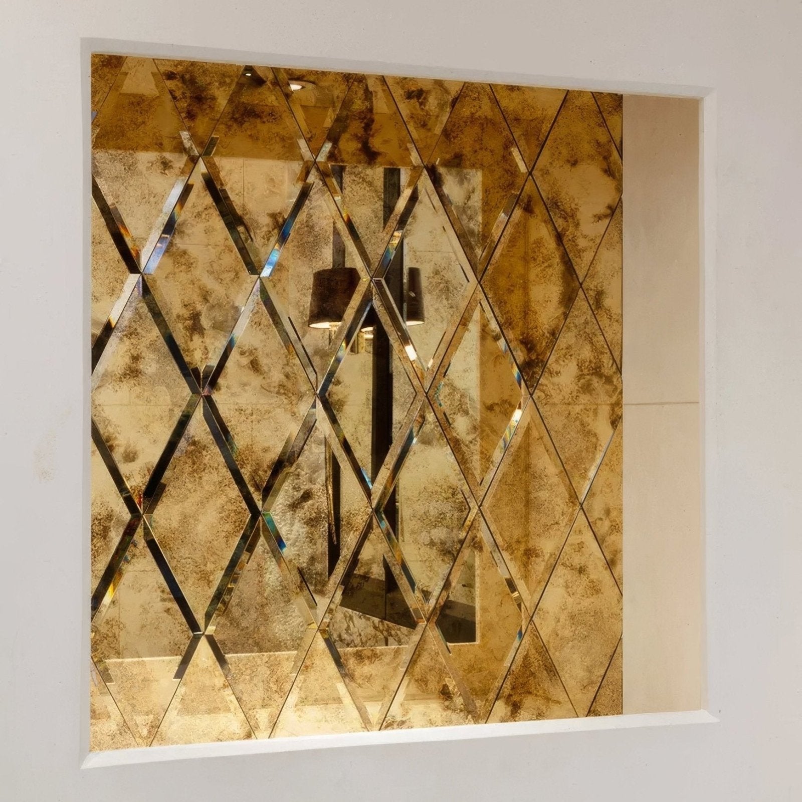 Rococo mirror diamond glass brass with gold-toned mirrored panel featuring diamond pattern and subtle patina finish
