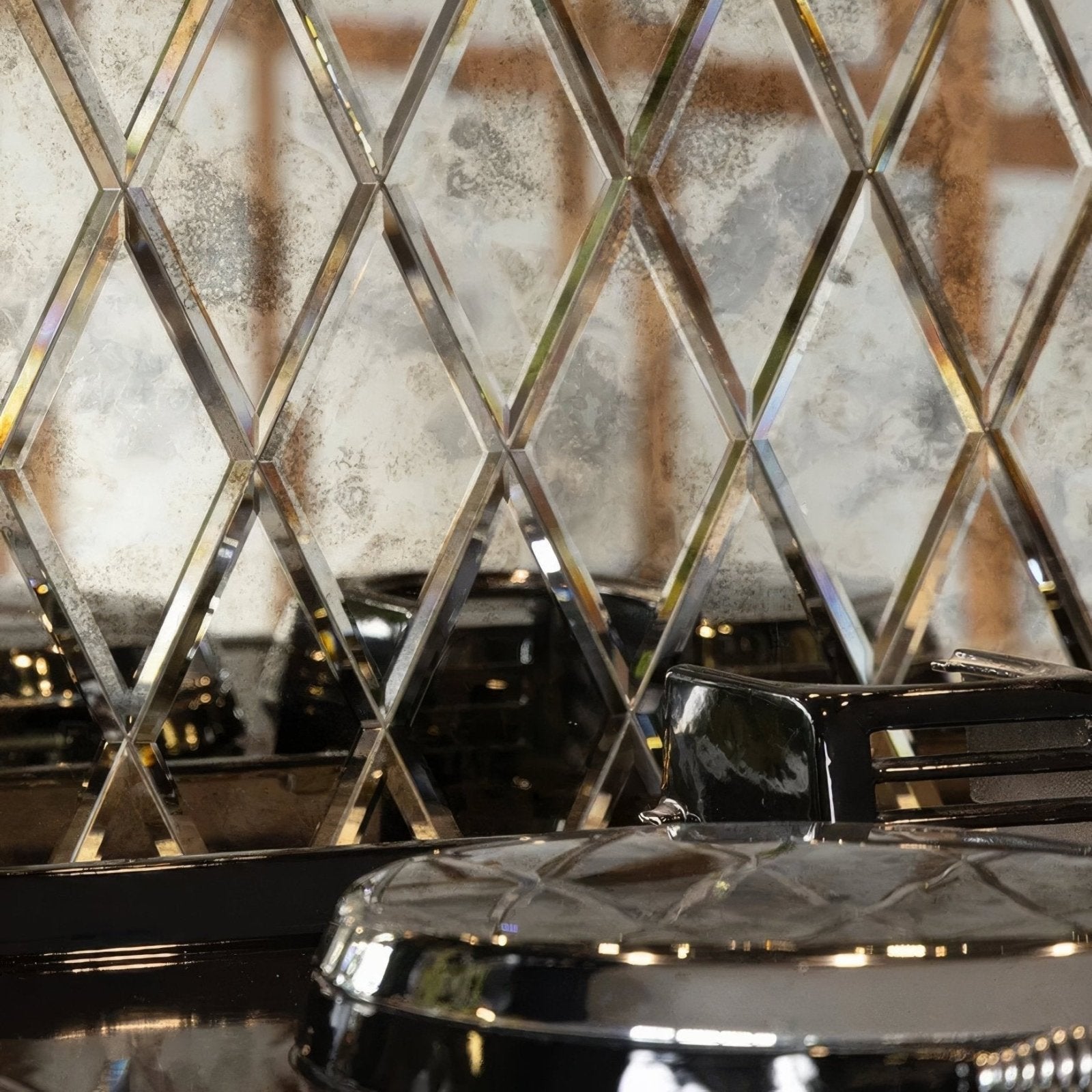 Shiny chrome diamond-patterned glass tile backsplash with mercury finish from rococo mirror diamond glass collection