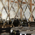 Shiny chrome diamond-patterned glass tile backsplash with mercury finish from rococo mirror diamond glass collection