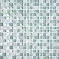 Rois mixed format mosaic tile panel with square glass pieces in mint green and white featuring marbled patterns