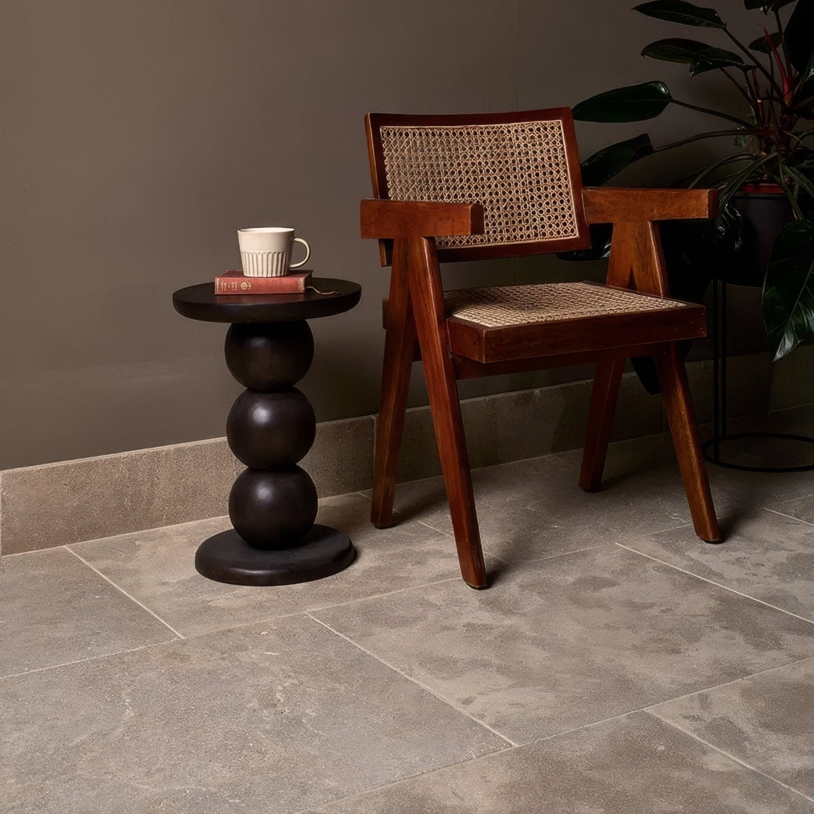 Dark wood cane chair with woven back and seat in romaine limestone velvet finish for stylish seating
