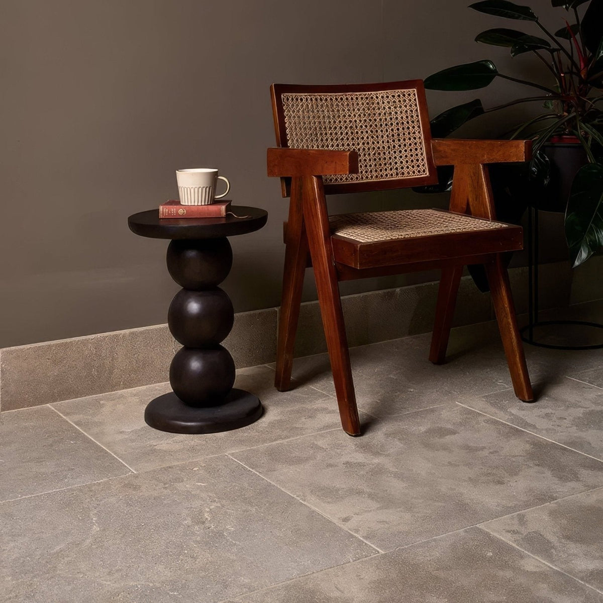 Dark wood cane chair with woven back and seat in romaine limestone velvet finish for stylish seating