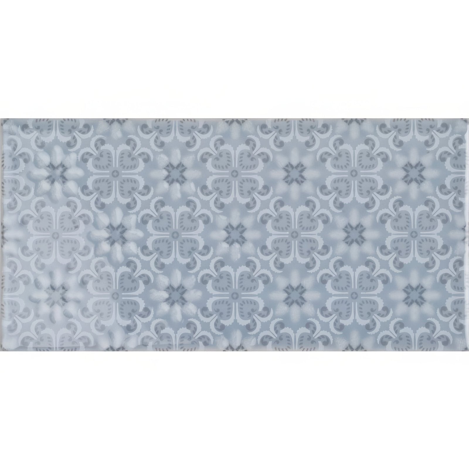 A rectangular ceramic tile rosemoor on snape with a subtle repeating floral pattern in light gray and white