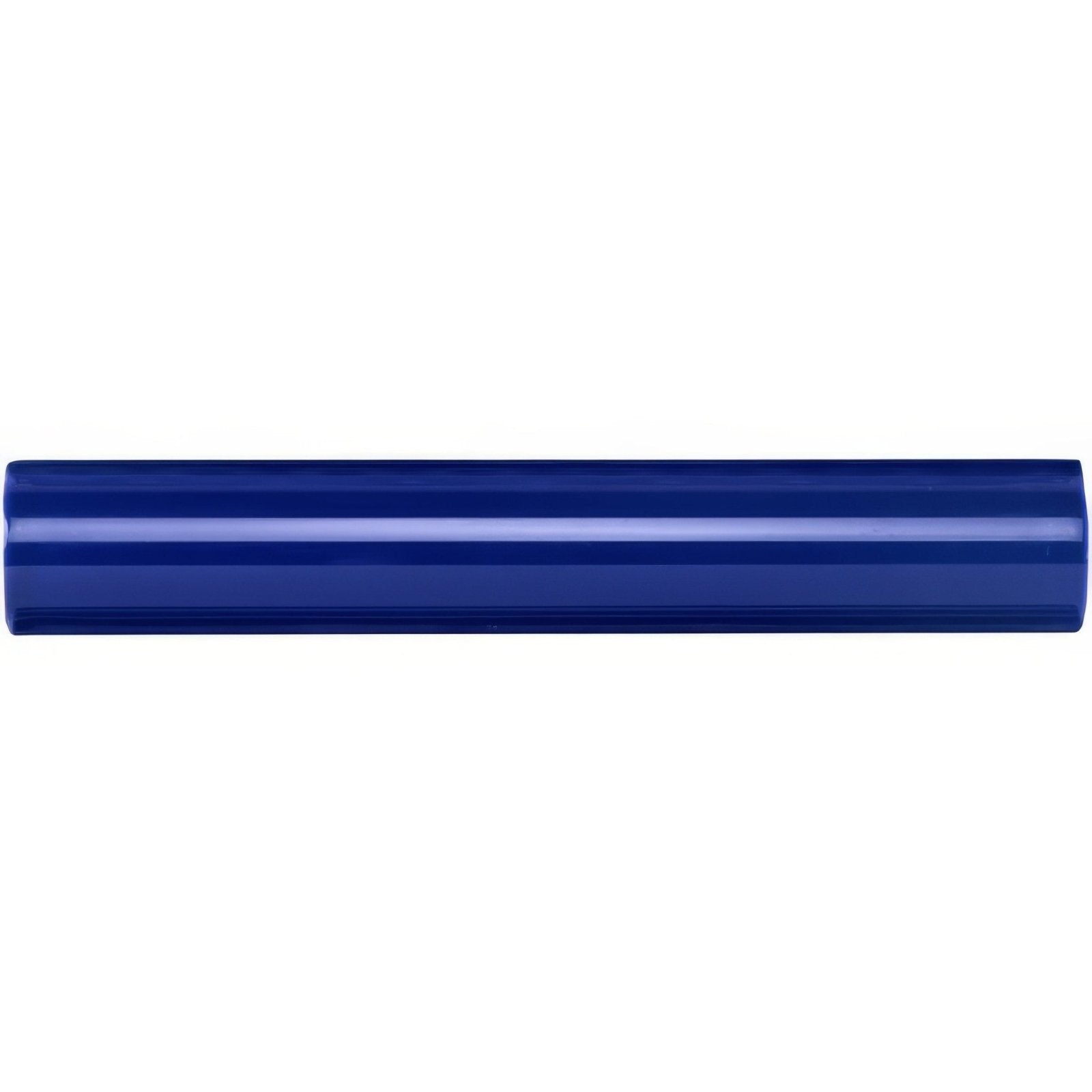 A sleek royal blue sigma moulding ceramic tile with glossy finish and smooth rectangular surface with ridges