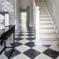 Black and white marble diamond patterned floor tiles in royal mink limestone tumbled finish for elegant flooring