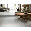 Modern minimalist sakai 1843 ivory dining table with light wood finish and sleek tapered legs for stylish dining areas