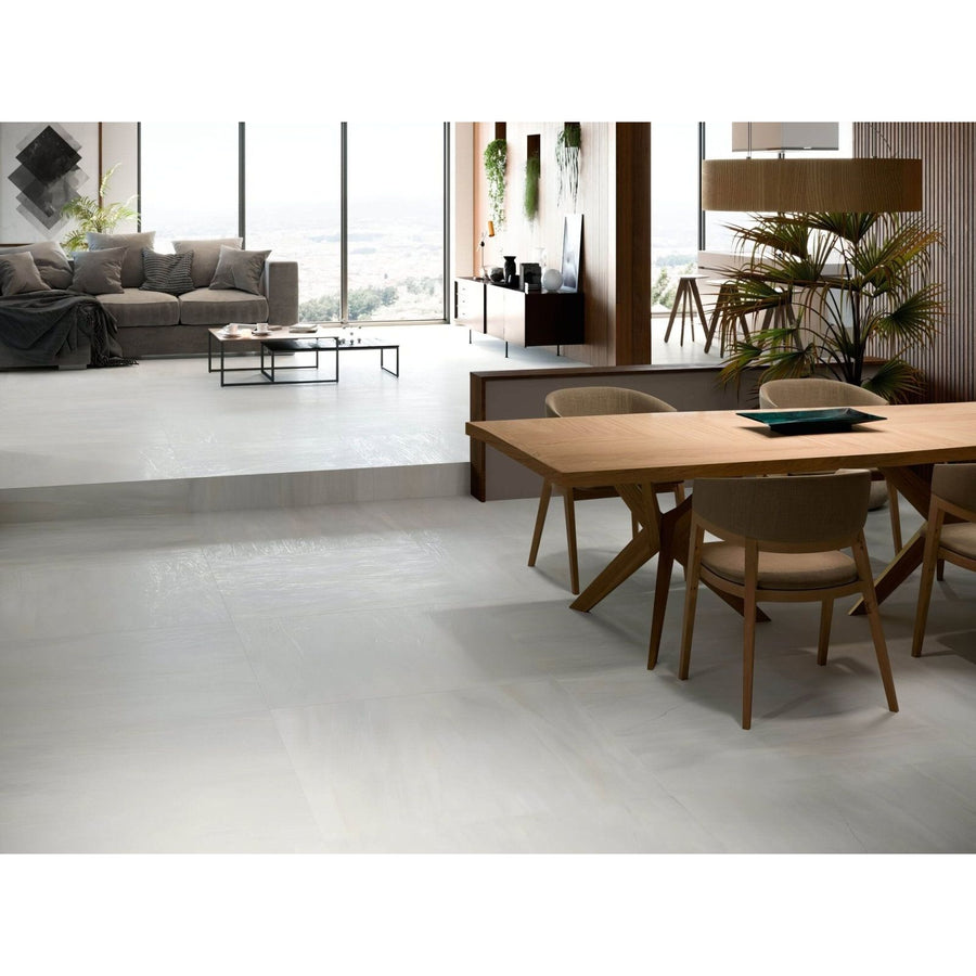 Modern minimalist sakai 1843 ivory dining table with light wood finish and sleek tapered legs for stylish dining areas