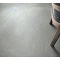 Gray concrete-effect floor tile sakai 1843 silver with subtle texture and speckled finish for modern interiors