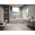 Modern gray taupe vanity with sleek drawers and white sink for contemporary bathroom storage and style
