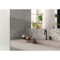 Sakura plains floral-patterned mosaic tile backsplash with muted greens browns and soft pinks on light background
