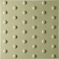 Beige sand tactile blister quarry tile 400x400mm with raised circular bumps in a grid pattern for safety guidance