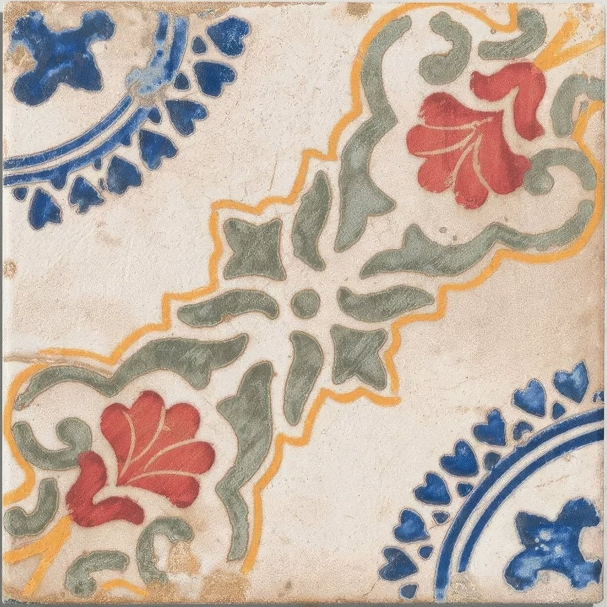 Vintage sardinia porcelain dragonetti ceramic tile with hand-painted red blue green and yellow floral motifs on off-white