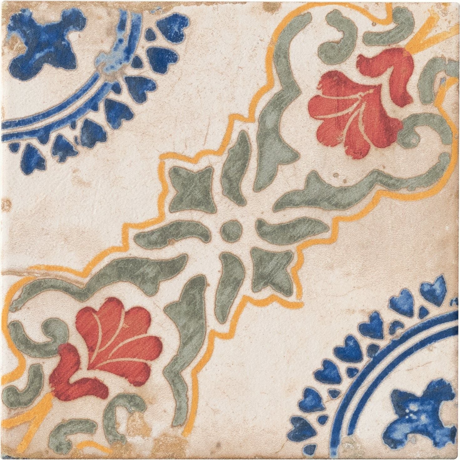 A sardinia porcelain dragonetti vintage-style ceramic tile with red blue green and yellow floral and geometric patterns