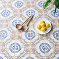 White speckled ceramic sardinia porcelain dragonetti plate holding five bright yellow lemons