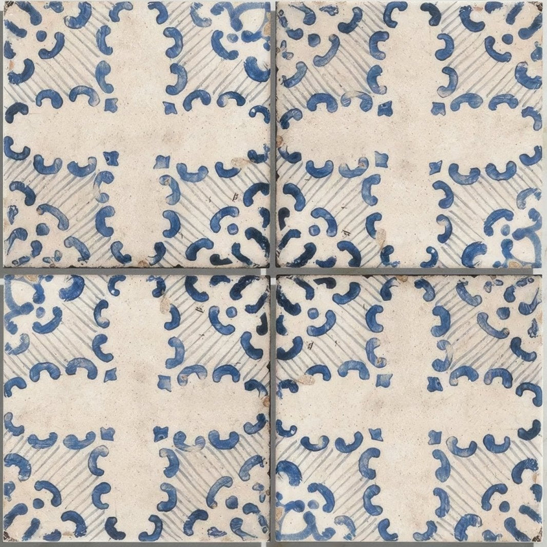 Blue and white porcelain sardinia tarricone tiles with repeating curved ceramic pattern for decorative use