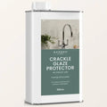 White metal canister with silver lid and green sarsen home label containing crackle glaze protector for interior use