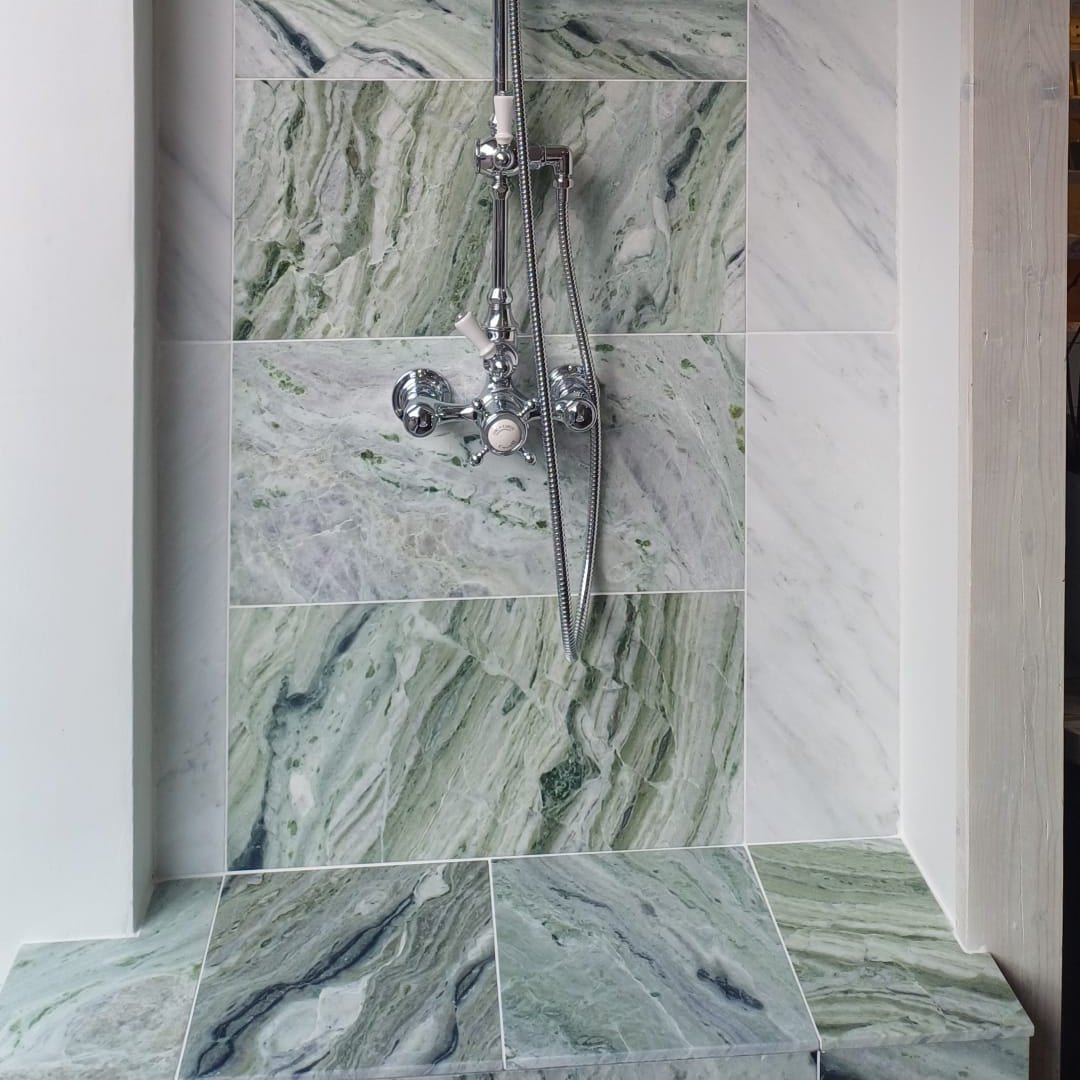 Seaspray Green Marble Tile 30 x 60cm green and white marble tile with a chrome shower tap