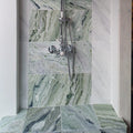 Seaspray Green Marble Tile 30 x 60cm green and white marble tile with a chrome shower tap