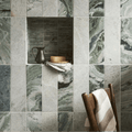 Seaspray Green Marble Tile 10 x 30cm green and white marble tiles with a metallic pitcher in a niche