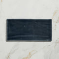 Dark gray rectangular ceramic tile with matte slightly textured surface from seaton ceramic beach hut collection