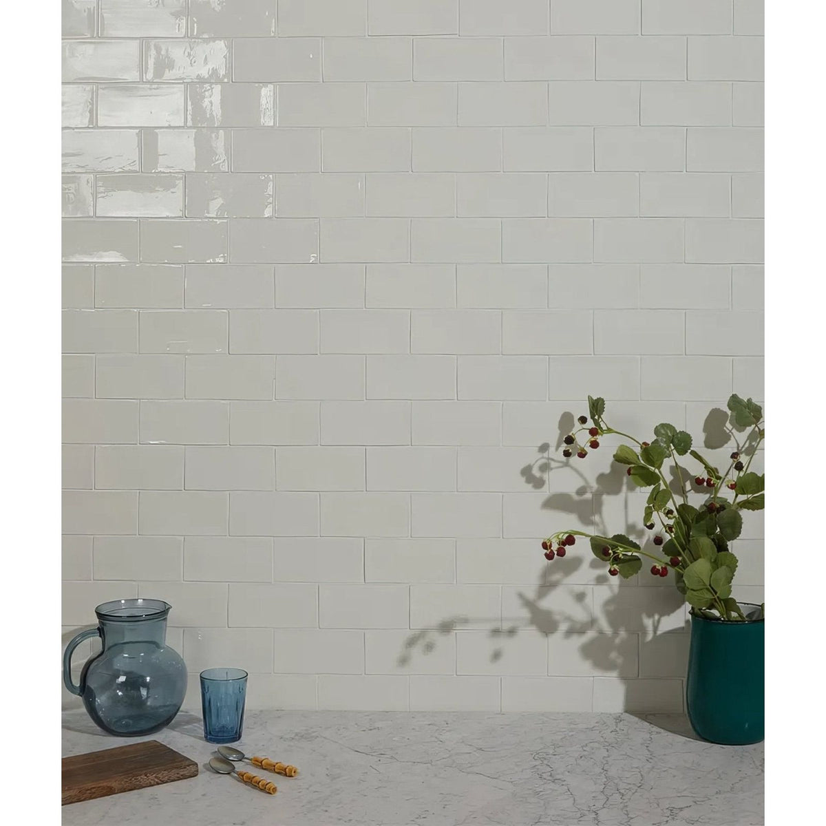 Seaton ceramic ice cream white glossy subway tiles with subtle sheen arranged in a classic brick pattern