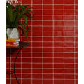 Seaton ceramic marmalade vibrant red glossy rectangular ceramic tiles with crisp white grout lines