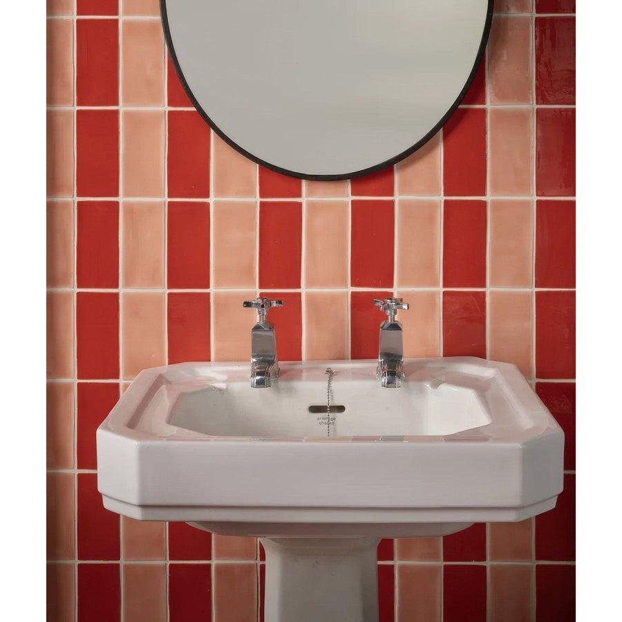 White ceramic pedestal sink with chrome faucets from seaton ceramic marmalade collection for bathroom use