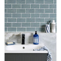 Blue pump bottle of dr in seaton ceramic rock pool product showing front label and pump dispenser