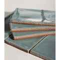 Stacked seaton ceramic rock pool tiles with matte teal glaze and rustic terracotta edges