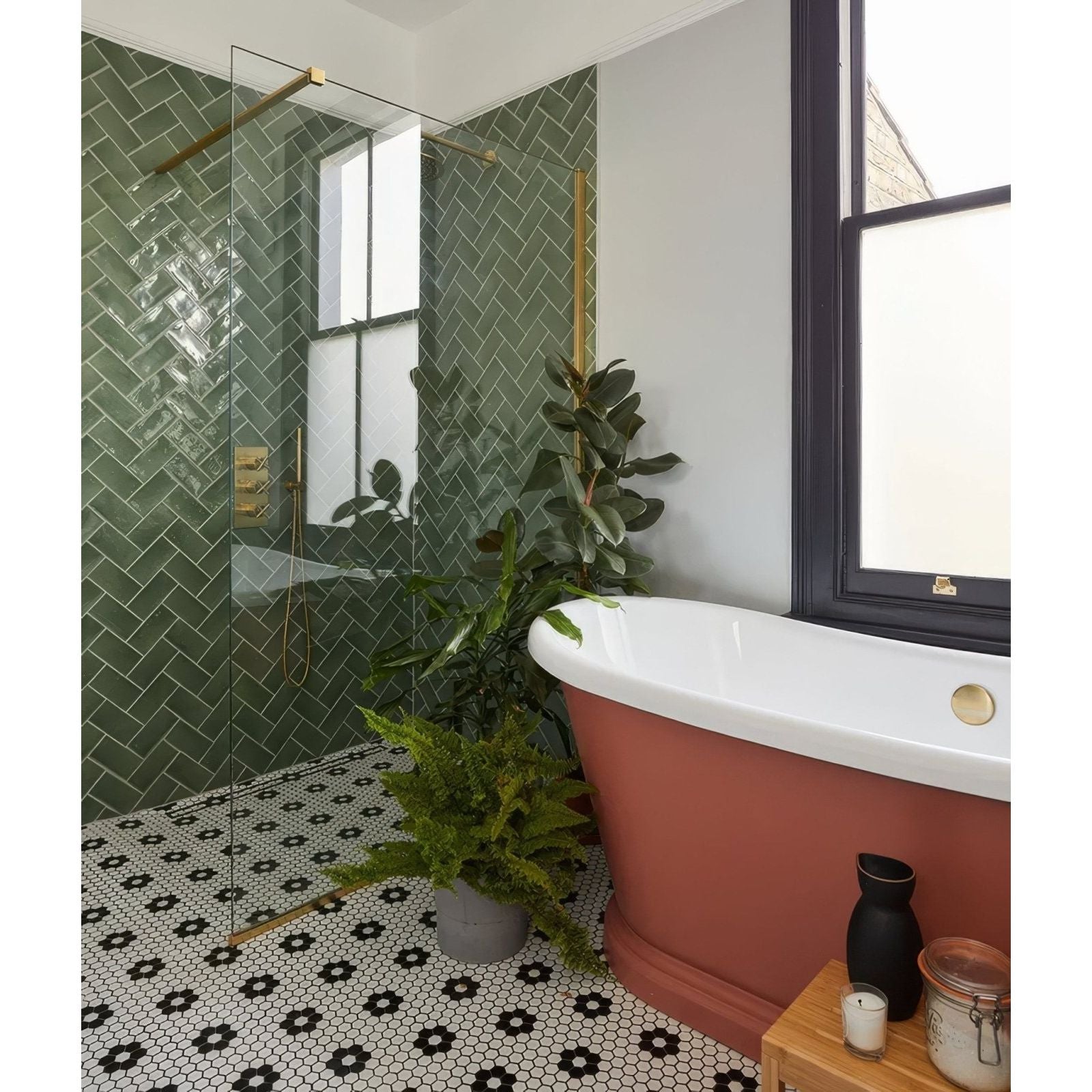 A freestanding Seaton ceramic bathtub with a white porcelain top and terracotta-colored base