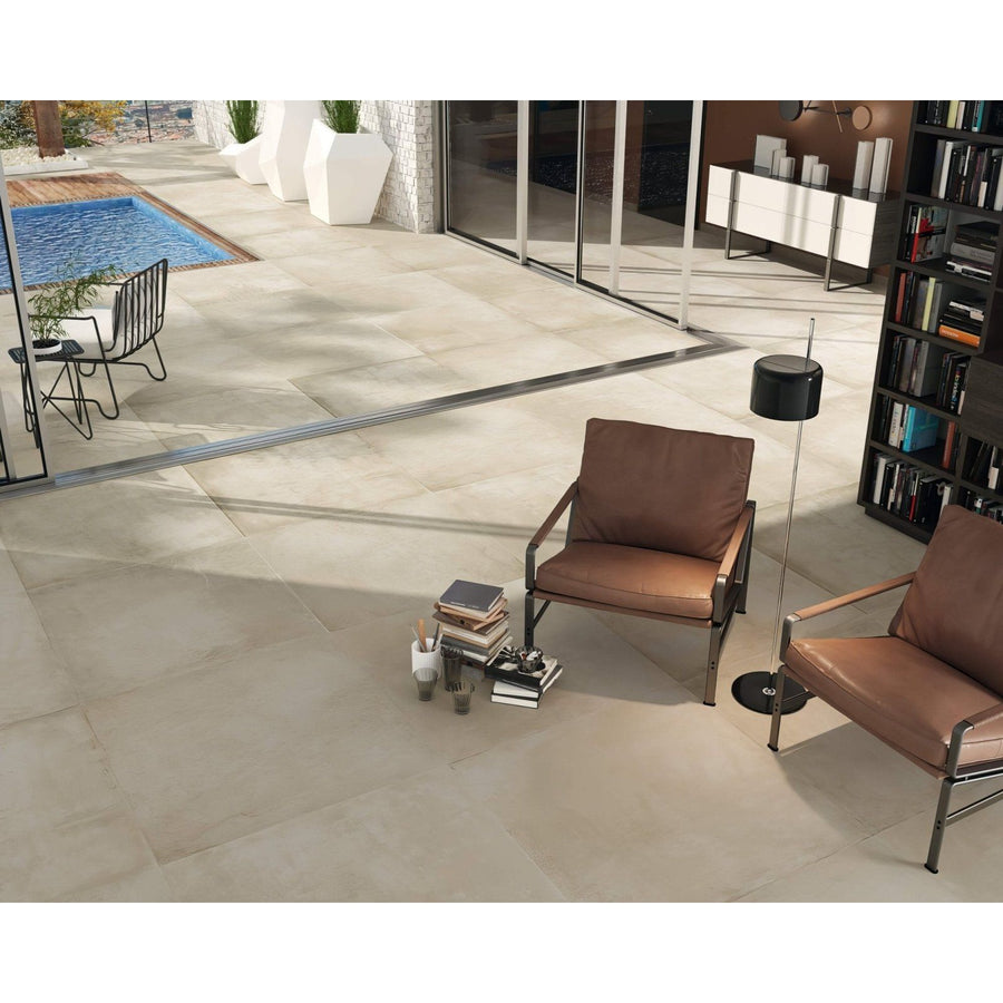 Beige rectangular stone tiles with a subtle matte finish arranged in a modern indoor outdoor space Seattle 1801 crema matt