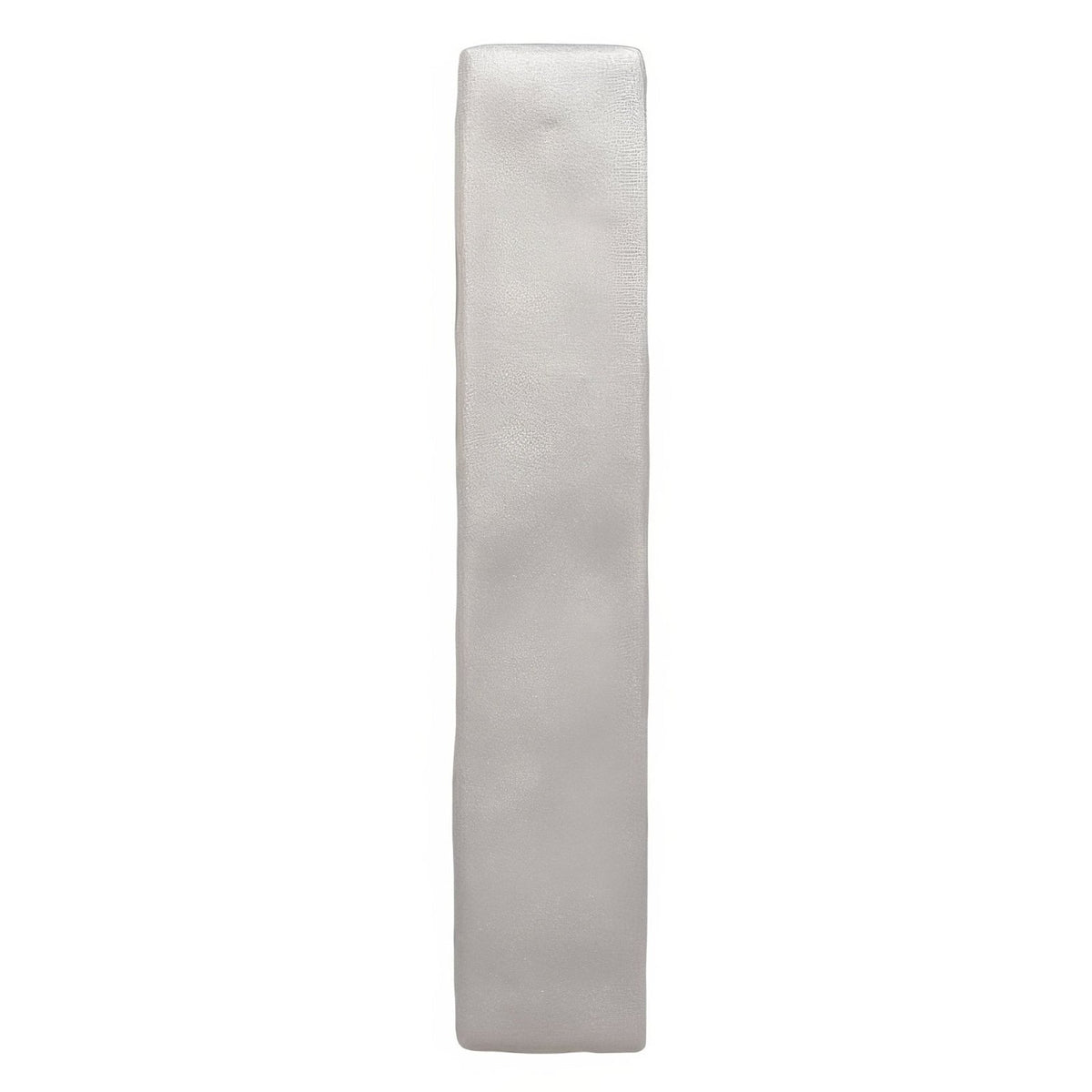 A sleek rectangular silver metal sherbet grey brick 5x25cm with a smooth slightly textured surface