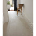 Sherborne porcelain light light beige matte ceramic tile floor with subtle grout lines for indoor use